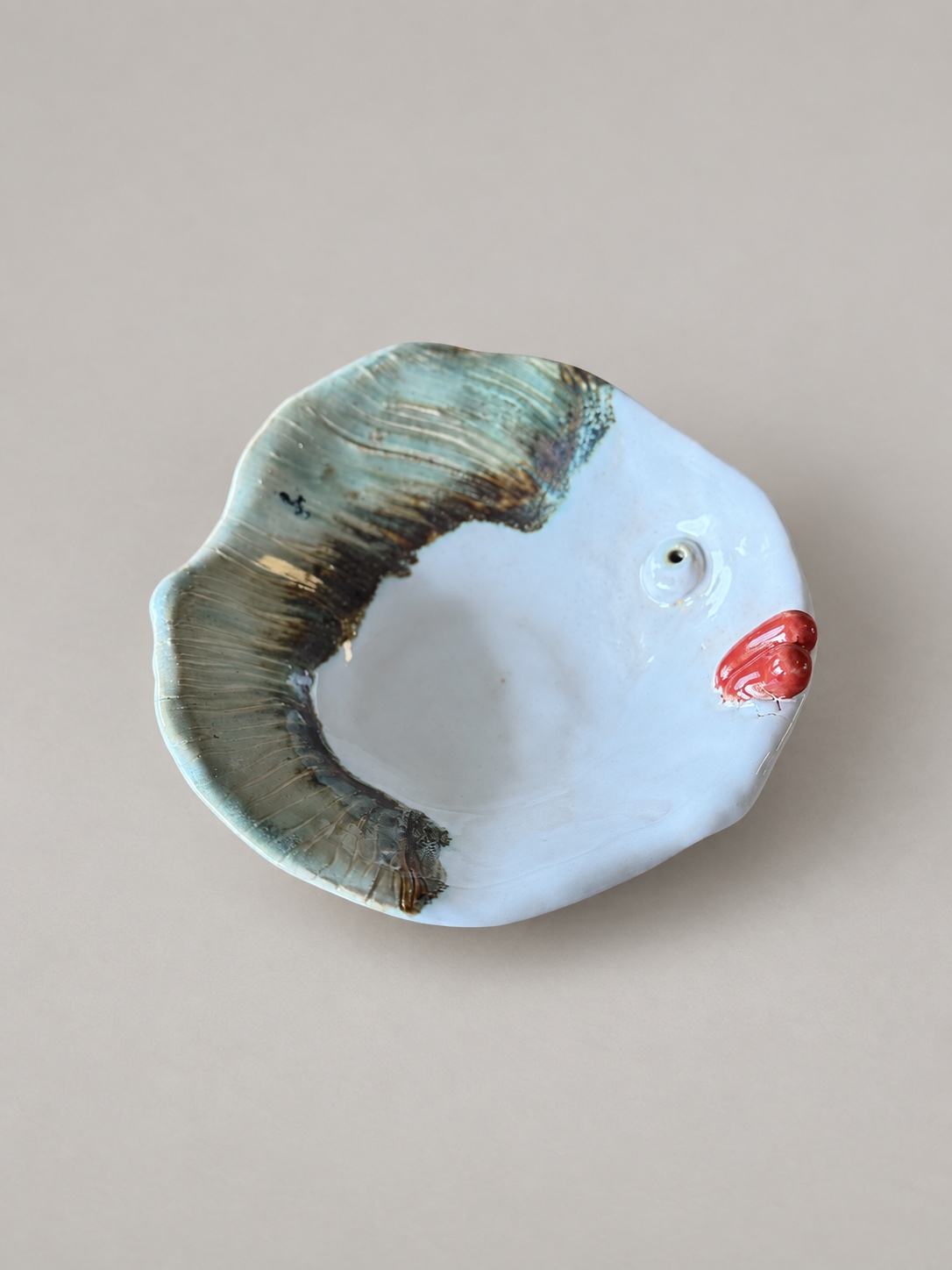 Green fish on little feet — handmade ceramic by Potpuri